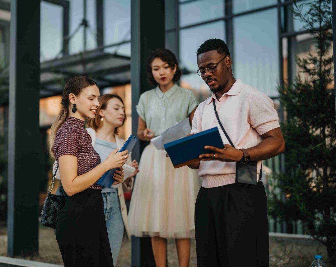 Group of young professionals outside collage
