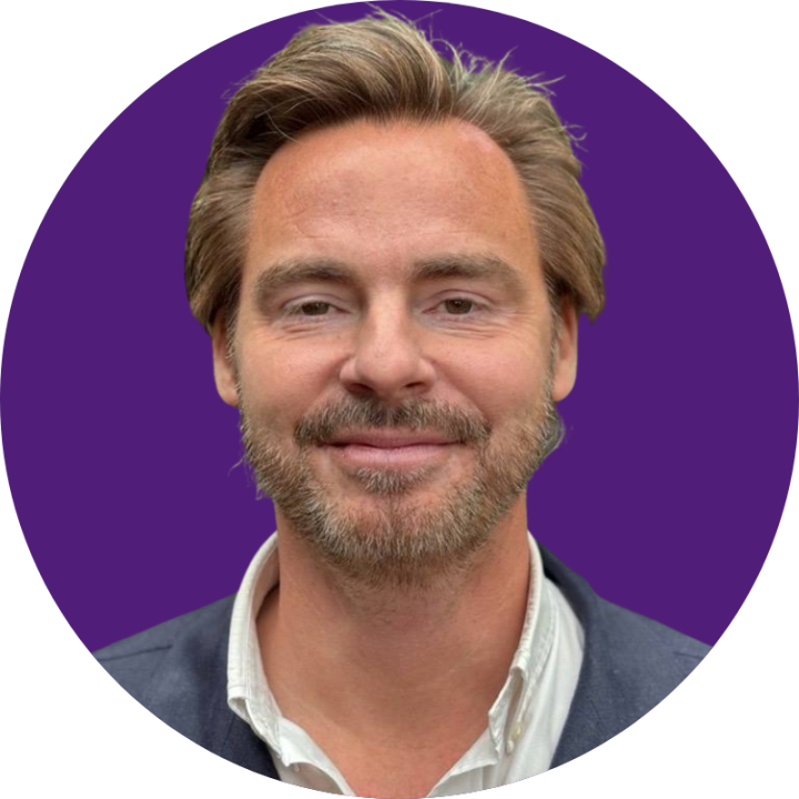 Magnus Drogell headshot with round purple background, CEO and founder of Pihr