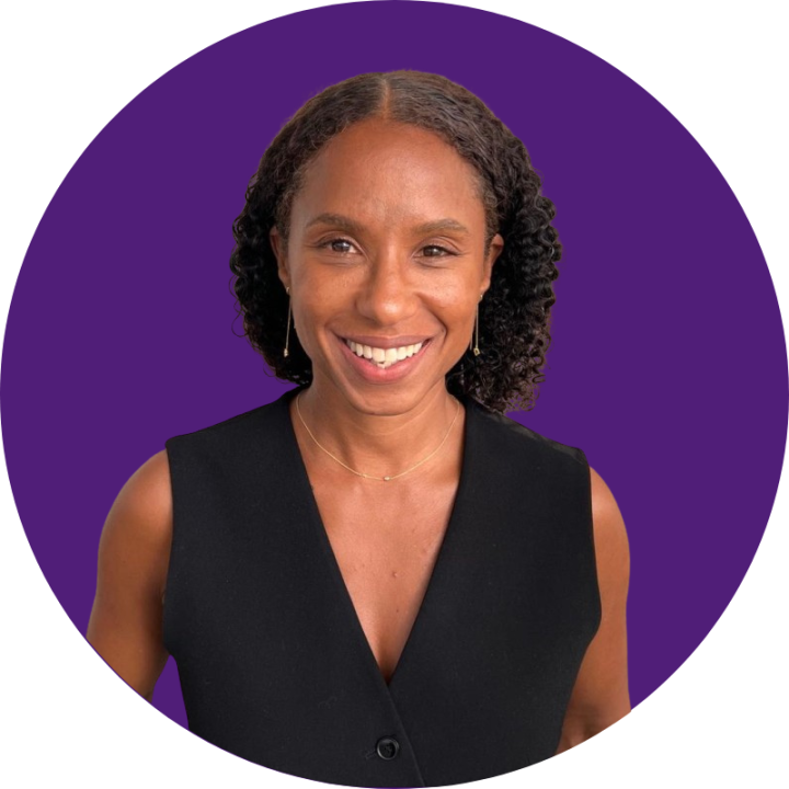 Sadie Percell headshot purple background