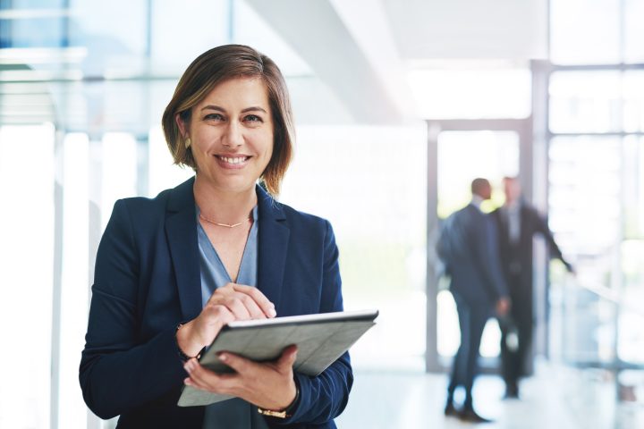 Professional woman with tablet.